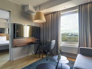 Telewizja i/lub zestaw kina domowego w obiekcie Radisson Blu Arlandia Hotel, Stockholm-Arlanda