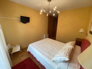 Ένα ή περισσότερα κρεβάτια σε δωμάτιο στο Portosín beach apartment +5 φωτογραφίες