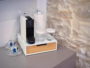 Ad Maiora - Design Rooms的咖啡和沏茶工具
