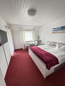 Postel nebo postele na pokoji v ubytování Hotel Pension Petra