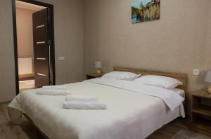Postel nebo postele na pokoji v ubytování Bliss House