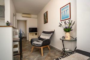 TV a/nebo společenská místnost v ubytování Apartments Ina & Ika