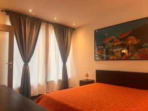 Postel nebo postele na pokoji v ubytování Harmony Lake Sirmione