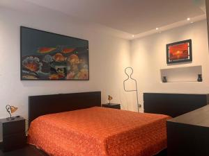 Postel nebo postele na pokoji v ubytování Harmony Lake Sirmione
