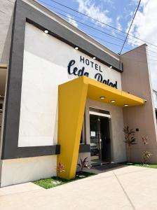 a hotel real madrid building with a hotel sign at Hotel Leda Rafael in João Câmara