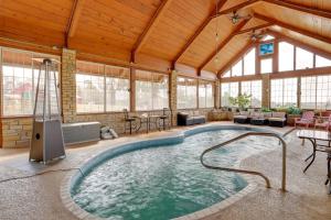 a large indoor swimming pool in a building at 366 Shared Acres, Lake Access: Ozark Getaway! in Fairfield Bay