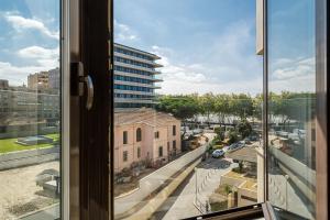 a view of a city from a window at GuestReady - A prime stay near the beach in Matosinhos