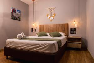 Postel nebo postele na pokoji v ubytování Hotel Casa 73 Deluxe