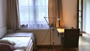 Łóżko lub łóżka w pokoju w obiekcie Hotel Villa Rückert