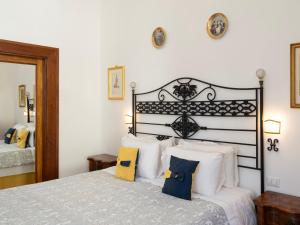 Postel nebo postele na pokoji v ubytování Borgia di Firenze