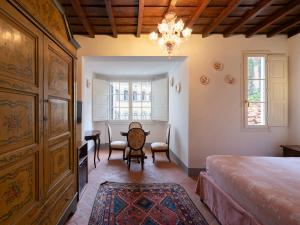 Postel nebo postele na pokoji v ubytování Borgia di Firenze