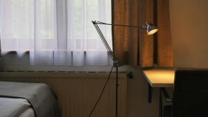 Łóżko lub łóżka w pokoju w obiekcie Hotel Villa Rückert