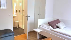 Łóżko lub łóżka w pokoju w obiekcie Hotel Villa Rückert