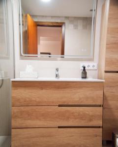 Un baño de CMApartamentos 12 fotos más