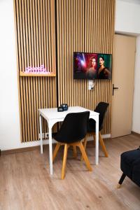 Μια τηλεόραση ή/και κέντρο ψυχαγωγίας στο Goodvibes Villeurbanne +7 φωτογραφίες