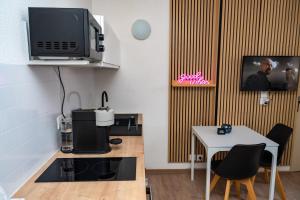 Μια τηλεόραση ή/και κέντρο ψυχαγωγίας στο Goodvibes Villeurbanne