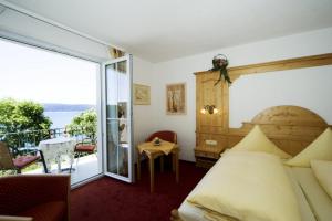 Postel nebo postele na pokoji v ubytování Seehotel Schäpfle