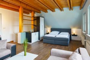 Ένα ή περισσότερα κρεβάτια σε δωμάτιο στο Ferienhaus CARPE DIEM in Gager WE 01 direkt am Bodden