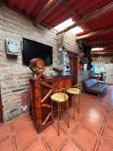 TV a/nebo společenská místnost v ubytování Quinta Paraíso Escondido