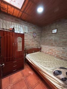 Postel nebo postele na pokoji v ubytování Quinta Paraíso Escondido