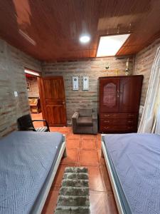 Postel nebo postele na pokoji v ubytování Quinta Paraíso Escondido