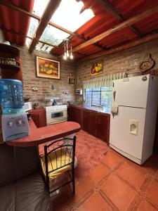 Kuchyň nebo kuchyňský kout v ubytování Quinta Paraíso Escondido