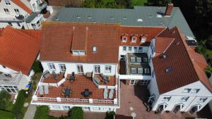 an overhead view of a house with a roof at Haus Bielefeld Zimmer 30a in Norderney