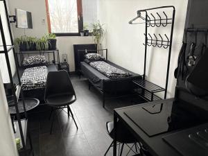 Postel nebo postele na pokoji v ubytování INDUSTRIAL ZONE-STUDIO 3