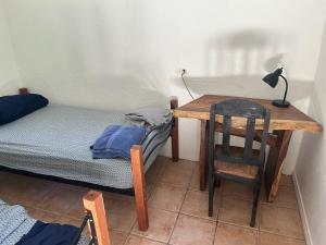 Postel nebo postele na pokoji v ubytování Pura Vida Hostel