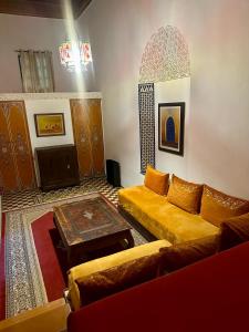 Posezení v ubytování Riad A La Belle Etoile