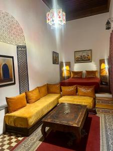 Posezení v ubytování Riad A La Belle Etoile