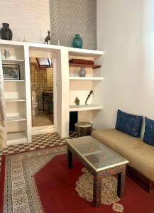 Posezení v ubytování Riad A La Belle Etoile