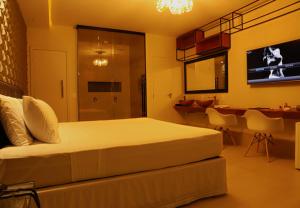 TV a/nebo společenská místnost v ubytování Green Apple Motel