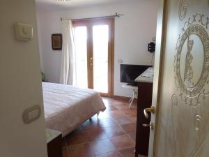 Postel nebo postele na pokoji v ubytování Casa La Liccia