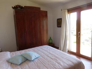Postel nebo postele na pokoji v ubytování Casa La Liccia