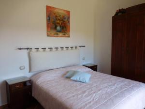 Postel nebo postele na pokoji v ubytování Casa La Liccia