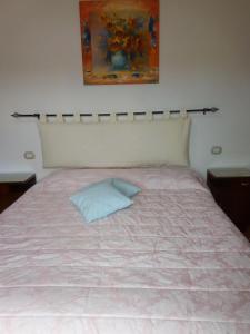 Postel nebo postele na pokoji v ubytování Casa La Liccia
