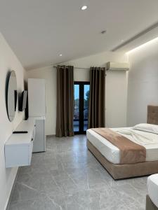 TV a/nebo společenská místnost v ubytování Molla Hotel Restorant