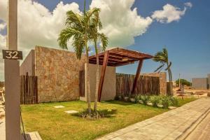 Κήπος έξω από το Uhane Luxury Villas