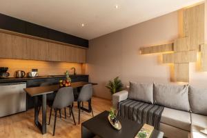 Kuchyň nebo kuchyňský kout v ubytování Semiso Beach Suites