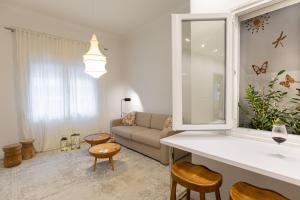 Posezení v ubytování Votsala Deluxe & Modern Apartments in Piraeus