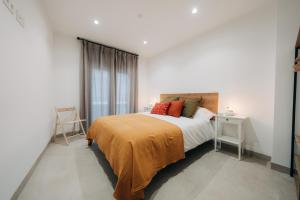 Ένα ή περισσότερα κρεβάτια σε δωμάτιο στο Casa Els Pardos