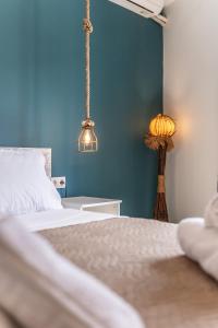 Posteľ alebo postele v izbe v ubytovaní Semiso Beach Suites