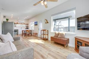 a living room with a couch and a table at Close to Canyon Lake Cabin - Boat Ramp and Hot Tub in Canyon Lake +16 photos