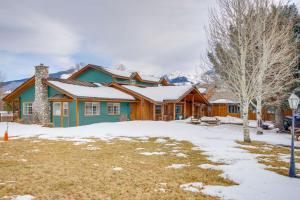 a house with snow in front of it at Views and Trail Access Scenic Montana Ranch Retreat in Emigrant