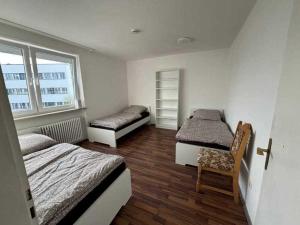 Postel nebo postele na pokoji v ubytování Penthouse Haar
