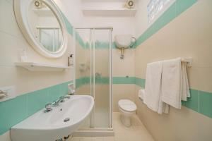 Koupelna v ubytování Hotel Marinaro