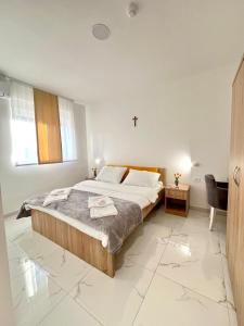 Postel nebo postele na pokoji v ubytování CASA della FIAMMA D'AMORE di MARIA + 16 fotografií