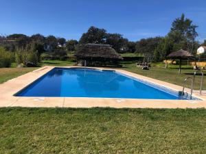 The swimming pool at or close to Cortijo Zalamea