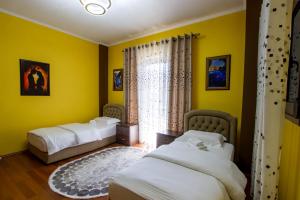 Letto o letti in una camera di Bora Hotel